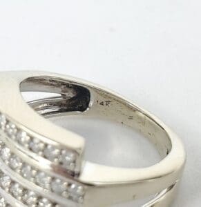 14K gold ring with diamond accents.