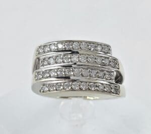 Silver ring with multiple diamond bands.