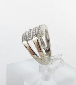 Silver ring with three parallel bands.