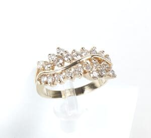 Gold ring with sparkling diamond accents.