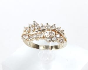 Gold ring with intricate diamond design.