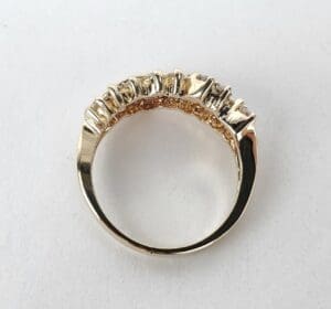 Gold ring with textured design.