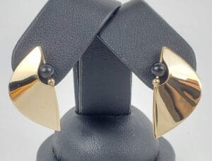 Gold and black modern design earrings.