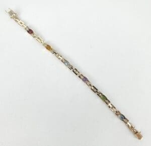 Bracelet with colorful stones on white background.