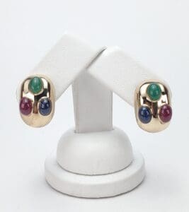 Gold earrings with colorful gemstone accents.