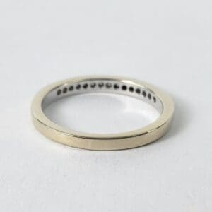 Silver ring on white background.