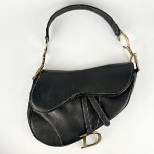 Black leather handbag with gold accents.