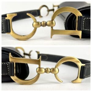 Brass buckles on black leather straps.