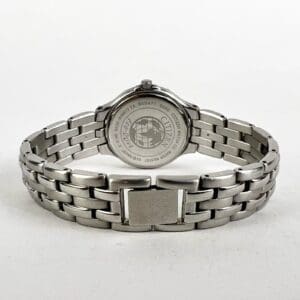 Back view of a silver wristwatch.