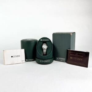 Citizen Eco-Drive watch with packaging and manuals.
