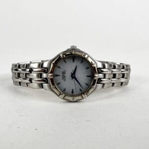 Silver wristwatch with metal band.