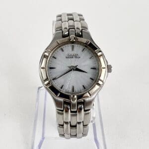 Silver wristwatch with a white dial.