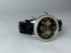 Luxury watch with diamond-studded bezel.