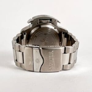 Silver Invicta watch with metal bracelet.