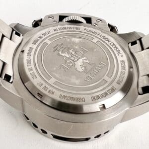 Back view of a silver wristwatch.