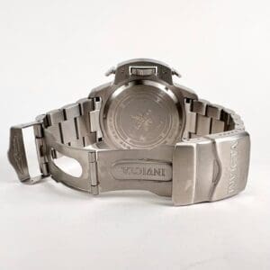 Silver watch with metal link bracelet.
