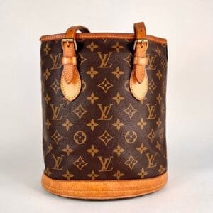 Luxury brown monogrammed designer handbag.
