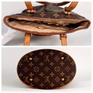 Brown designer handbag with monogram pattern.