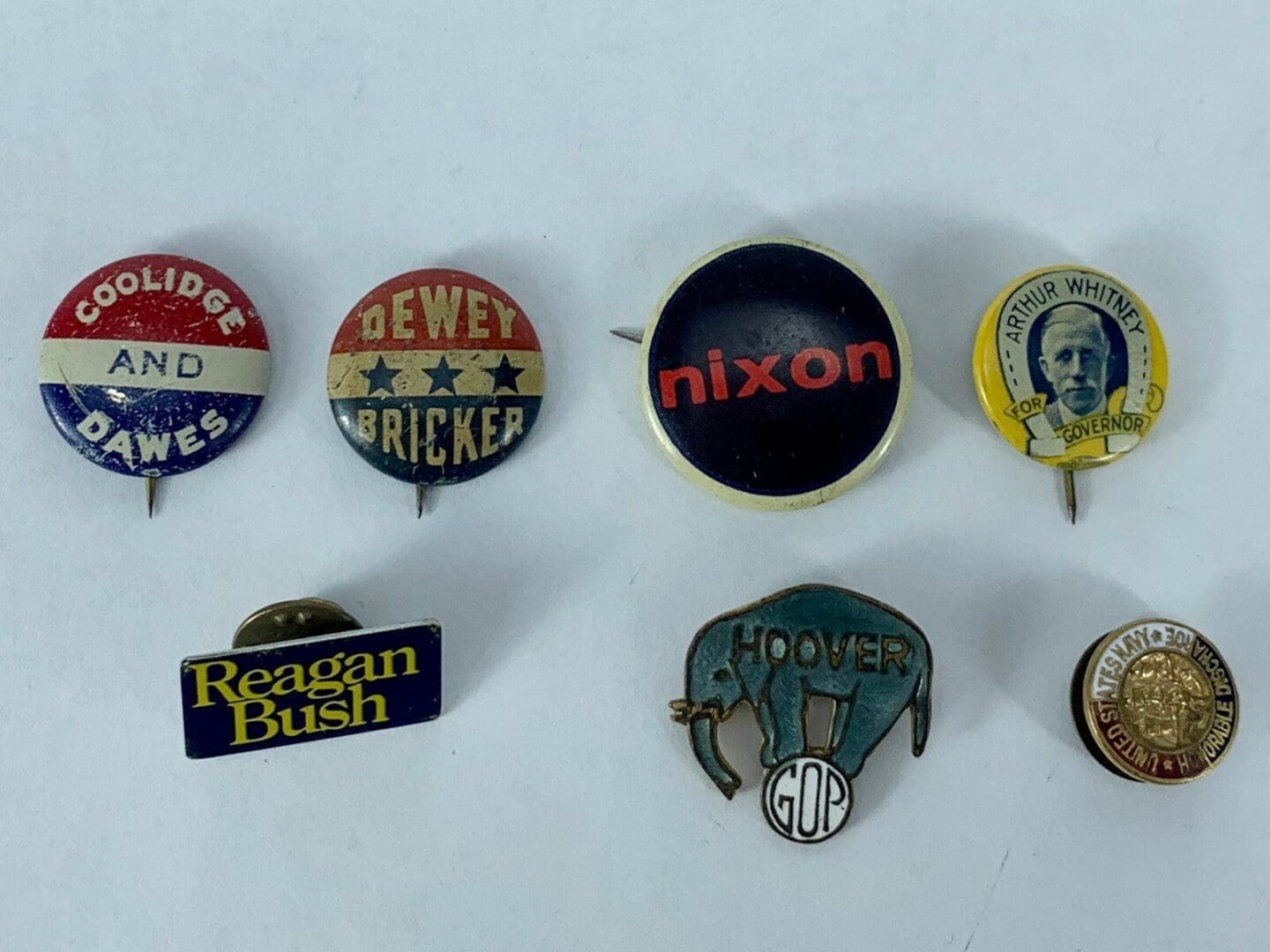 Vintage U.S. political campaign buttons collection.