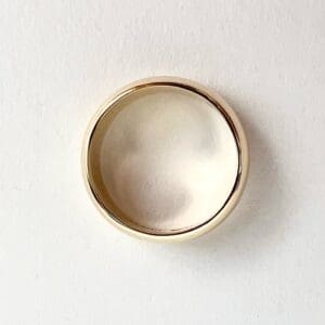 Gold ring on white background.