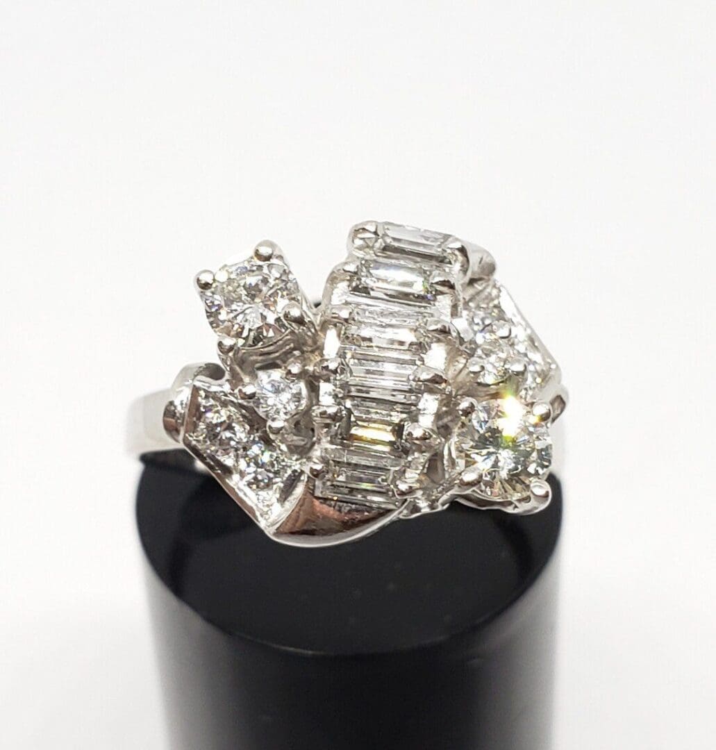 Diamond ring with baguette and round stones.