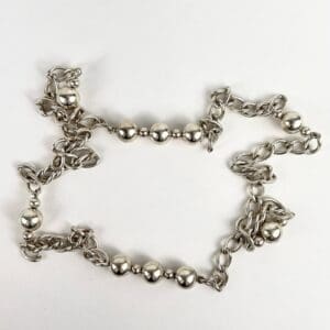 Silver chain with spherical beads arrangement.