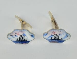 Viking ship cufflinks with colorful enamel.