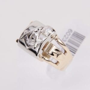 Gold and silver ring with diamond.