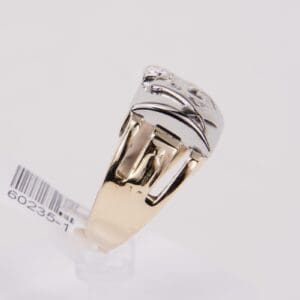 Gold and silver ring with barcode tag.