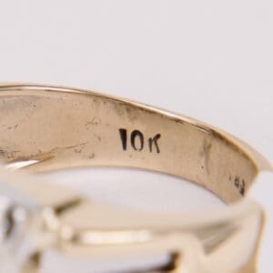 Gold ring with "10K" engraving inside band.