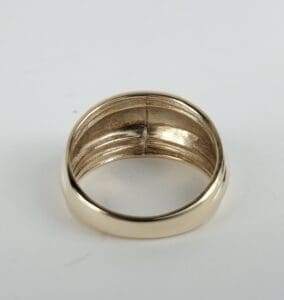 Gold ring on white background.