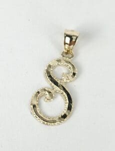 Gold letter "S" pendant on white background.