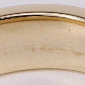 Gold ring with engraved inscription, 14K marking.