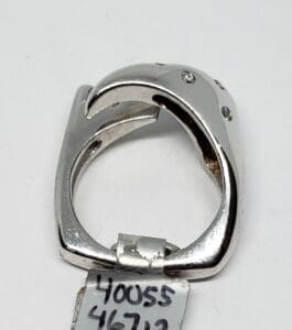 Silver ring with unique claw design.