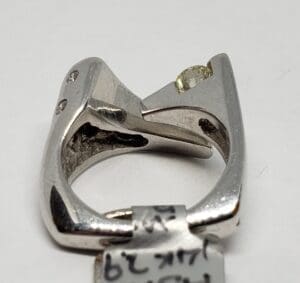 Silver ring with unique geometric design.