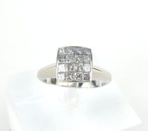 Silver ring with square diamond cluster.