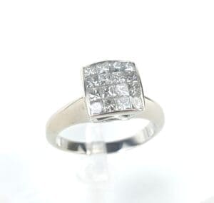 Silver ring with square diamond cluster.