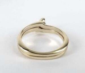 Gold ring with a diamond setting.