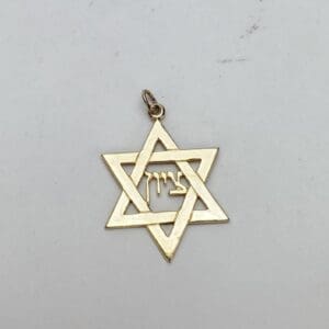 Star of David pendant with Hebrew letters.