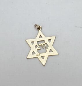 Gold Star of David pendant with Chai.