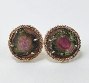 Two round watermelon tourmaline earrings.