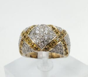 Gold and silver diamond-encrusted ring.