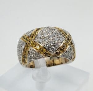 Gold and silver diamond-studded ring.