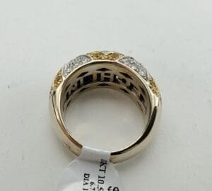 Gold and silver ring with diamonds.