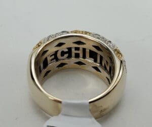 Gold ring with engraved inside text.