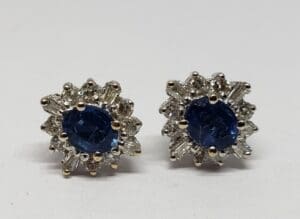 Blue gemstone earrings with silver accents.