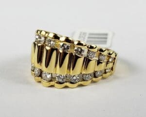 Gold ring with diamond accents.