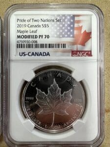 Silver Canadian maple leaf coin in protective case.