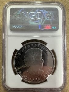 Silver coin in NGC graded holder.