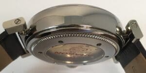 Back view of a silver wristwatch.